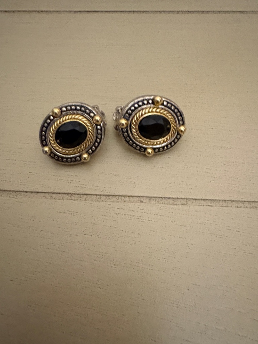 Clip-On Two-Tone Black Oval Stone Stud Earrings with Gold Accents